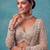 beige net embroidered bridal lehenga choli