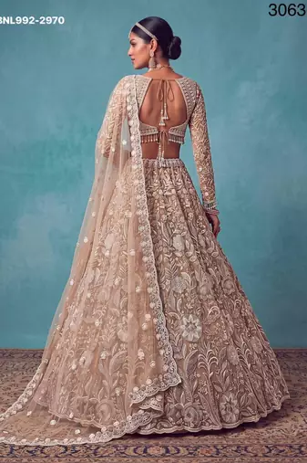 beige net embroidered bridal lehenga choli