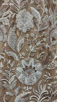 beige net embroidered bridal lehenga choli 4