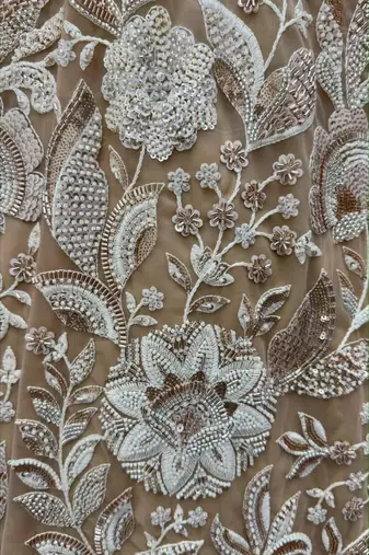 beige net embroidered bridal lehenga choli