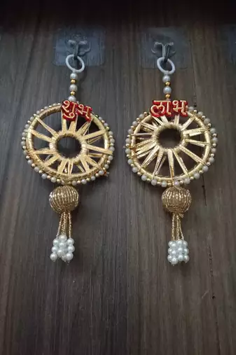 traditional indian decorative hanging festive door garland with pearls and lotus for diwali home decor