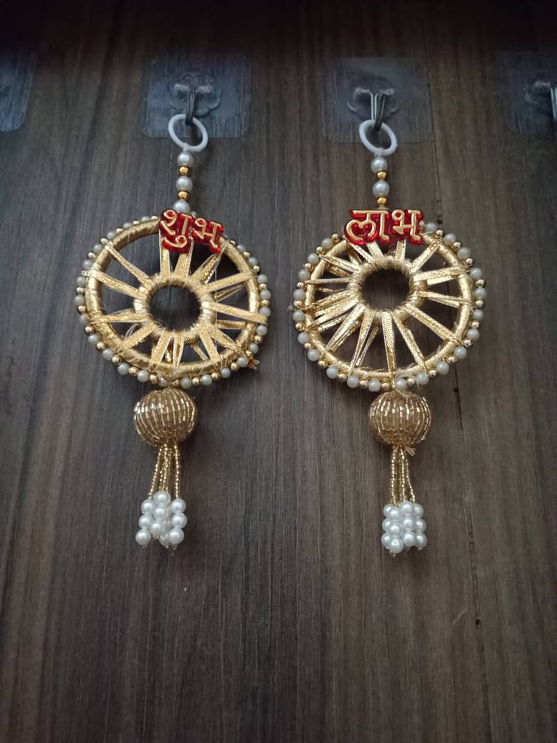 traditional indian decorative hanging festive door garland with pearls and lotus for diwali home decor