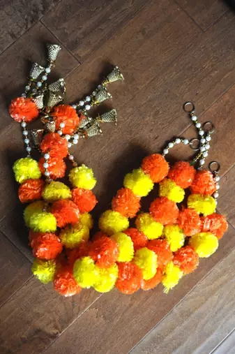 handmade orange and yellow genda door hanging with golden bells for home festive decor pack of 6