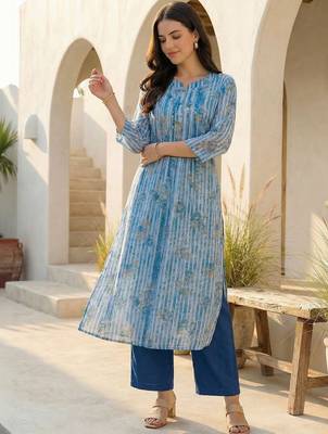 Women Printed Regular Pure Cotton Kurta with Trousers 1