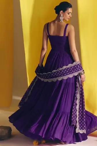 Purple embroidered vichitra silk flared salwar suit set with dupatta