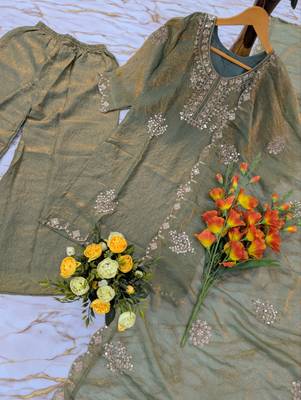 Women's light green silk blend embroidered kurta set with palazzo and dupatta 3