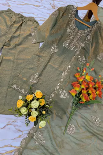 Women's light green silk blend embroidered kurta set with palazzo and dupatta