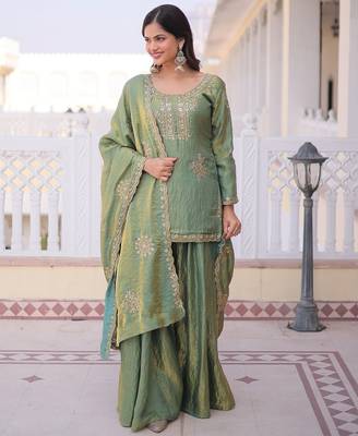 Women's light green silk blend embroidered kurta set with palazzo and dupatta 3