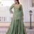 Women's light green silk blend embroidered kurta set with palazzo and dupatta