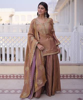 Women's peach silk blend embroidered kurta set with palazzo and dupatta 1