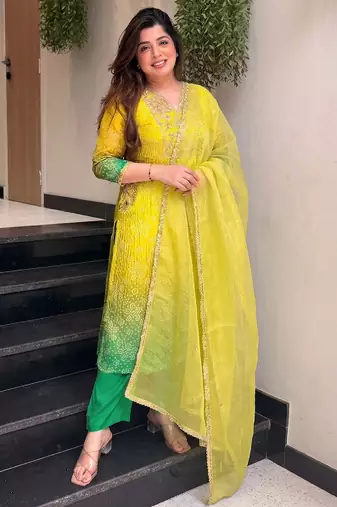 Women's yellow silk blend embroidered straight kurta set with pant and dupatta