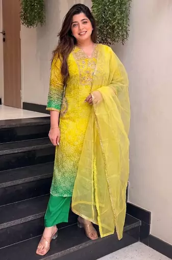 Women's yellow silk blend embroidered straight kurta set with pant and dupatta