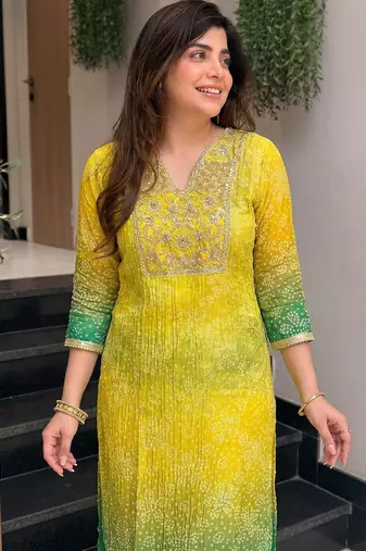 Women's yellow silk blend embroidered straight kurta set with pant and dupatta
