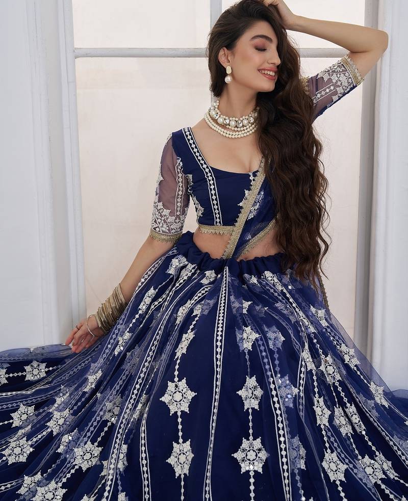 Charming Navy Blue Thread Embroidery Net Wedding Wear Lehenga Choli