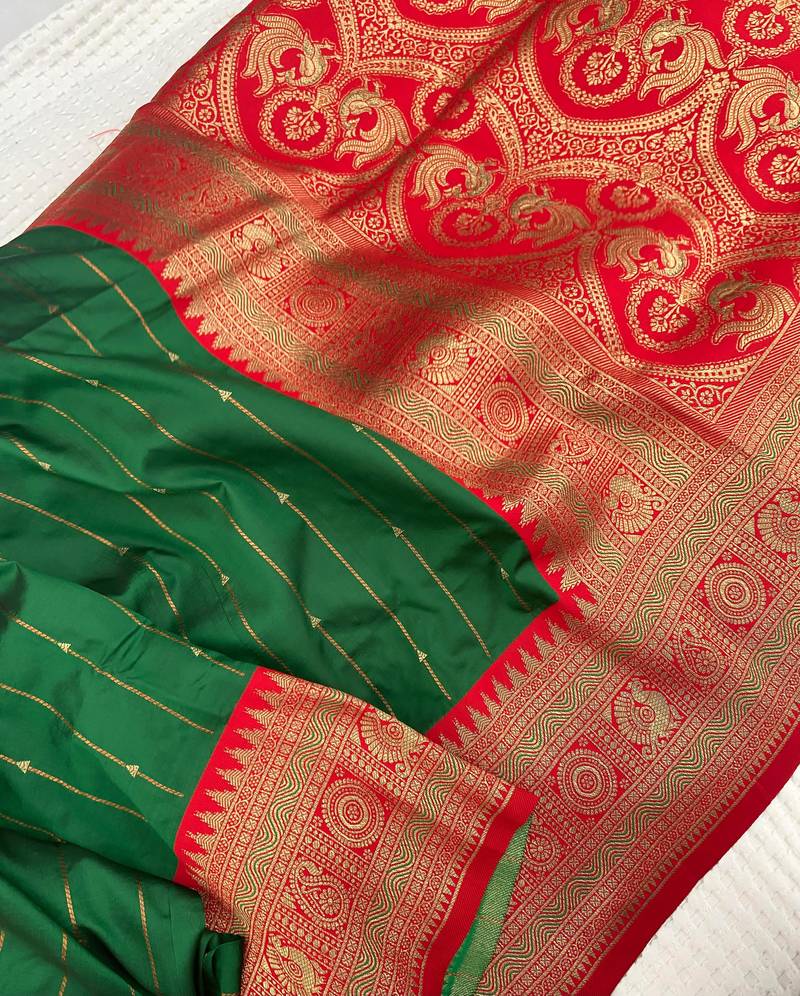 green color rich contrast weaving pallu and border kanchi weaving buttis on border silk blend saree