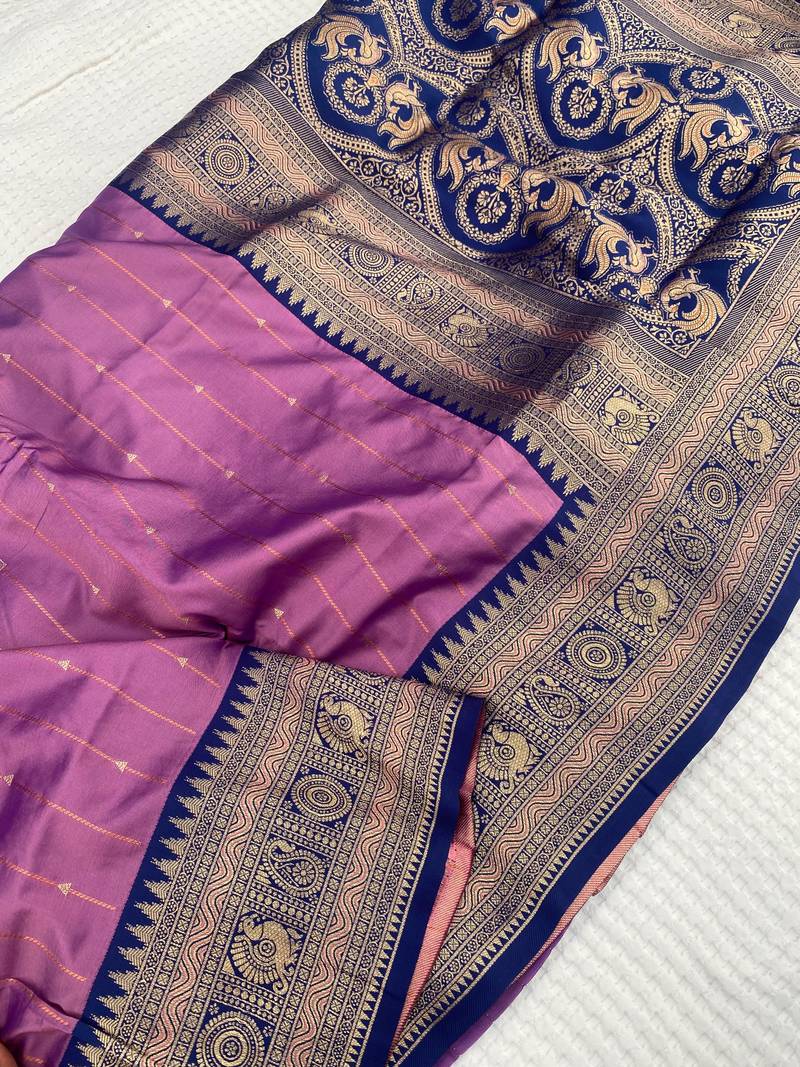 lavender color rich contrast weaving pallu and border kanchi weaving buttis on border silk blend saree