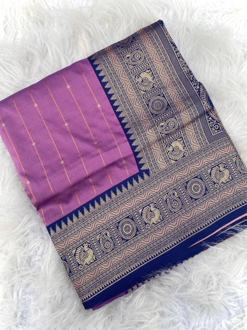 lavender color rich contrast weaving pallu and border kanchi weaving buttis on border silk blend saree