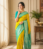 mustard yellow color rich contrast weaving pallu and border kanchi weaving buttis on border silk blend saree