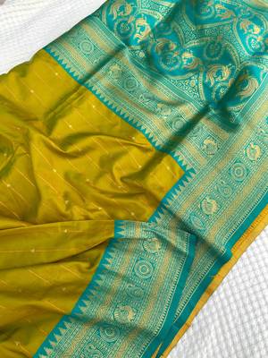 mustard yellow color rich contrast weaving pallu and border kanchi weaving buttis on border silk blend saree 3