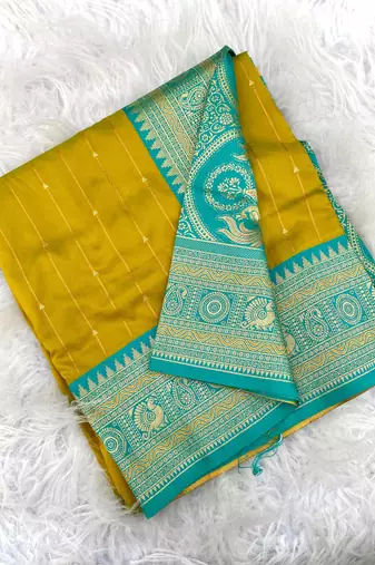 mustard yellow color rich contrast weaving pallu and border kanchi weaving buttis on border silk blend saree