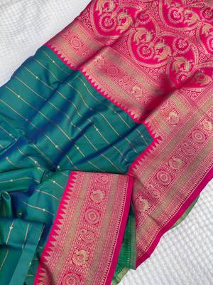 sea green color rich contrast weaving pallu and border kanchi weaving buttis on border silk blend saree 3