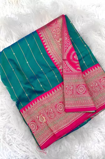 sea green color rich contrast weaving pallu and border kanchi weaving buttis on border silk blend saree