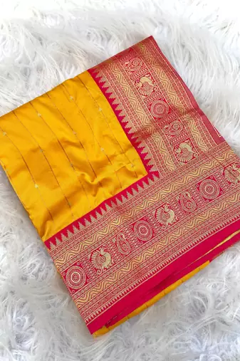 yellow color rich contrast weaving pallu and border kanchi weaving buttis on border silk blend saree