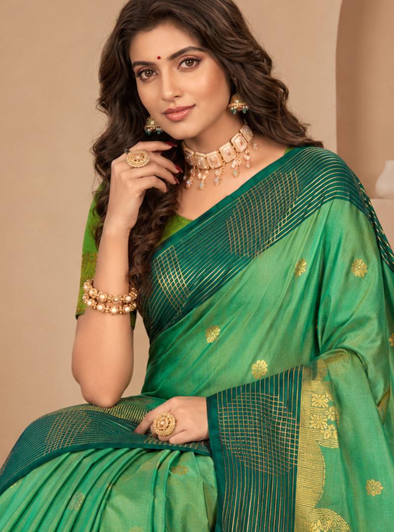 Sangam prints mint green soft silk blend woven work traditional saree