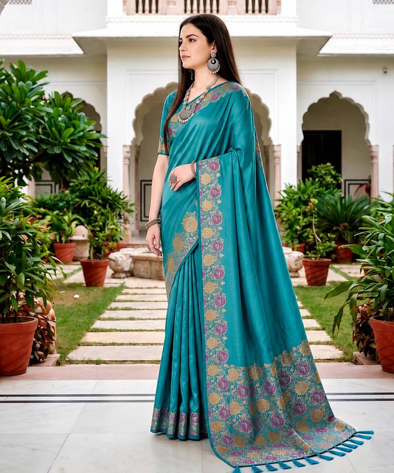 Sangam prints teal blue satin woven work traditional saree