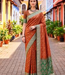 Sangam prints rust orange satin woven work traditional saree