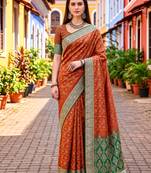 Sangam prints rust orange satin woven work traditional saree