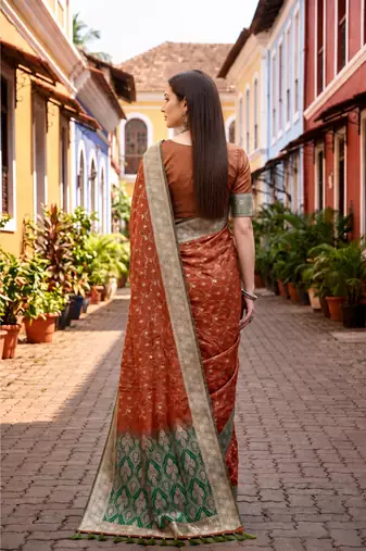 Sangam prints rust orange satin woven work traditional saree