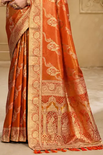 Sangam prints rust orange satin woven work traditional saree