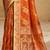 Sangam prints rust orange satin woven work traditional saree