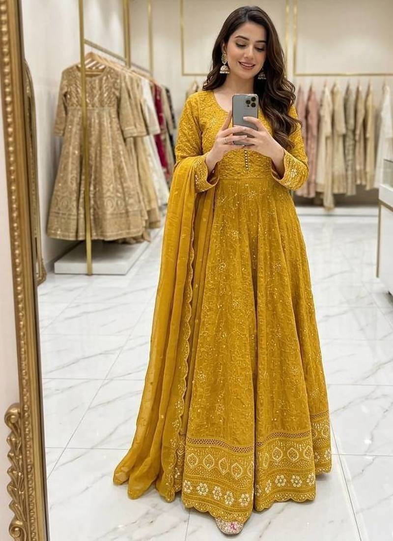 yellow color embroidery sequin work faux georgette gown set