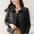 Women’s black  lambskin leather jacket -asymmetrical button style
