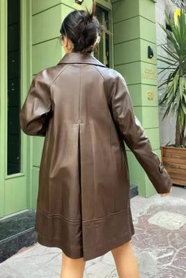 Women’s mid-length belted leather brown trench-style coat 3
