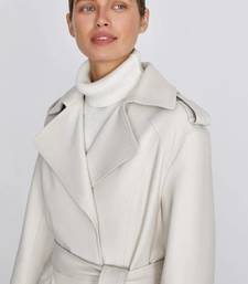 Women’s mid-length belted leather white trench-style coat 