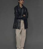 Women’s classic mid-length belted leather black trench-style coat