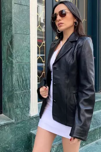 Women’s mid-length leather coat black trench style zipper coat