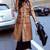 Women’s full-length safari-inspired leather trench coat burnished warm cognac brown