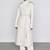 Women’s white full-length safari-inspired leather trench coat