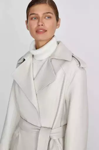 Women’s white full-length safari-inspired leather trench coat