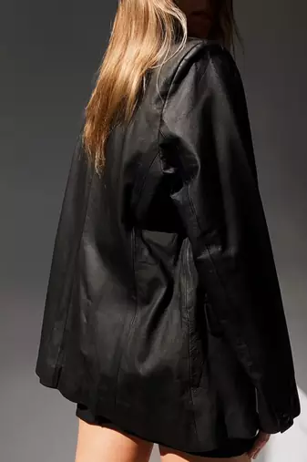 Women’s  black tailored trench style leather coat