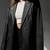 Women’s  black tailored trench style leather coat