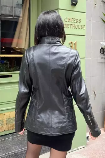 Women’s  black tailored trench style zipper leather coat