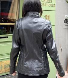 Women’s  black tailored trench style zipper leather coat