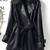 Women’s black mid-length tailored trench style belted leather coat