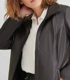 Women’s black trench style leather coat zip detail