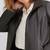 Women’s black trench style leather coat zip detail